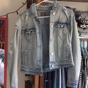 light wash ripped jean jacket